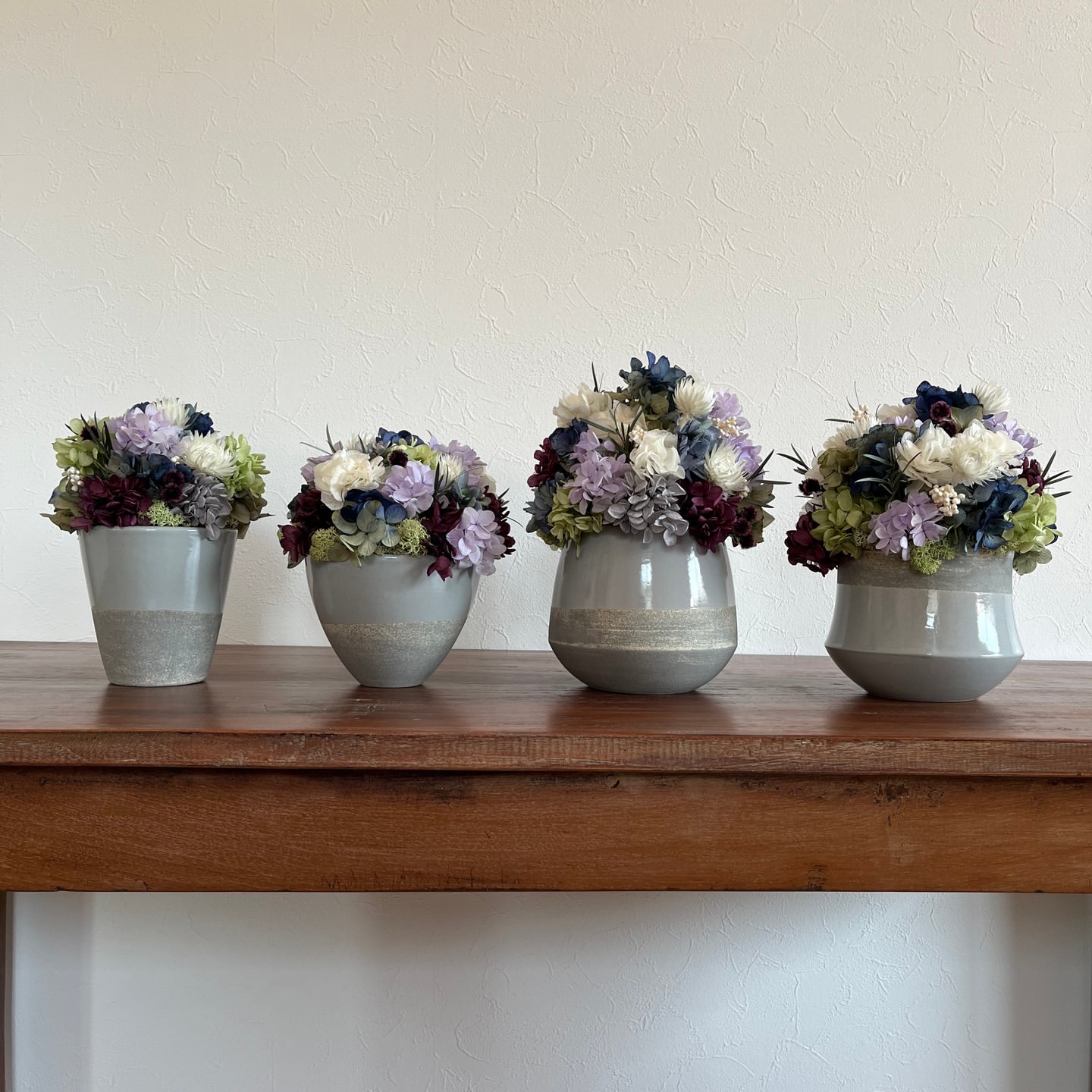 Photo-by-Little-Gardener-on-June-18-2023.-May-be-an-image-of-napkin-ring-vase-flower-arrangement-flower-pot-globe-amaranth-and-babys-breath